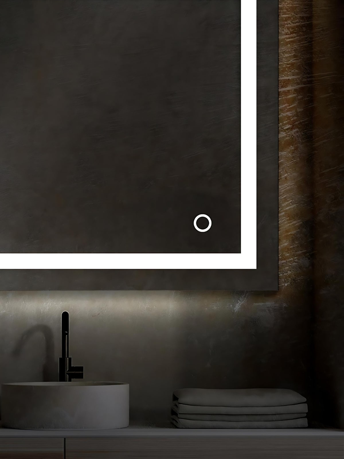 Illuminated mirrors come with a button that can hardwired into a bathroom switch if desired.